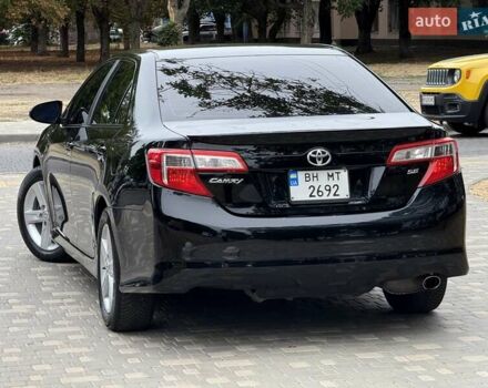 Черный Тойота Камри, объемом двигателя 2.5 л и пробегом 196 тыс. км за 13600 $, фото 29 на Automoto.ua