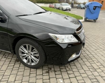 Черный Тойота Камри, объемом двигателя 2.5 л и пробегом 200 тыс. км за 9900 $, фото 1 на Automoto.ua