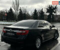 Чорний Тойота Камрі, об'ємом двигуна 2.5 л та пробігом 287 тис. км за 12999 $, фото 4 на Automoto.ua