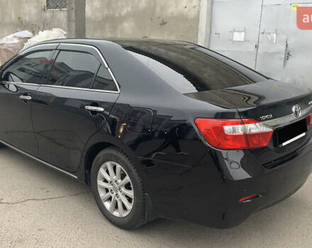 Чорний Тойота Камрі, об'ємом двигуна 2.5 л та пробігом 124 тис. км за 14700 $, фото 2 на Automoto.ua
