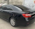 Чорний Тойота Камрі, об'ємом двигуна 2.5 л та пробігом 124 тис. км за 14700 $, фото 2 на Automoto.ua