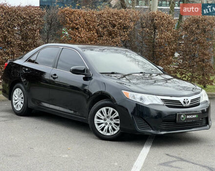 Чорний Тойота Камрі, об'ємом двигуна 2.49 л та пробігом 199 тис. км за 10999 $, фото 1 на Automoto.ua