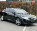 Чорний Тойота Камрі, об'ємом двигуна 2.49 л та пробігом 199 тис. км за 10999 $, фото 1 на Automoto.ua