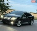 Черный Тойота Камри, объемом двигателя 2.5 л и пробегом 250 тыс. км за 14800 $, фото 1 на Automoto.ua