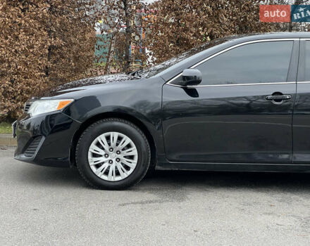 Чорний Тойота Камрі, об'ємом двигуна 2.49 л та пробігом 199 тис. км за 10999 $, фото 11 на Automoto.ua