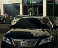 Черный Тойота Камри, объемом двигателя 2.49 л и пробегом 260 тыс. км за 13300 $, фото 1 на Automoto.ua