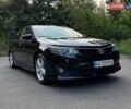 Черный Тойота Камри, объемом двигателя 2.49 л и пробегом 228 тыс. км за 11500 $, фото 1 на Automoto.ua