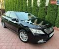 Черный Тойота Камри, объемом двигателя 2.5 л и пробегом 216 тыс. км за 14700 $, фото 1 на Automoto.ua
