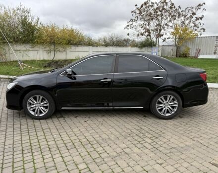 Черный Тойота Камри, объемом двигателя 2.5 л и пробегом 200 тыс. км за 9900 $, фото 2 на Automoto.ua