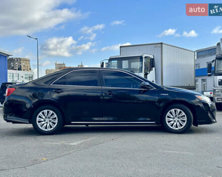 Черный Тойота Камри, объемом двигателя 2.49 л и пробегом 240 тыс. км за 11600 $, фото 1 на Automoto.ua