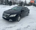 Чорний Тойота Камрі, об'ємом двигуна 2.49 л та пробігом 280 тис. км за 14500 $, фото 1 на Automoto.ua