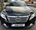 Черный Тойота Камри, объемом двигателя 2.5 л и пробегом 185 тыс. км за 12000 $, фото 1 на Automoto.ua