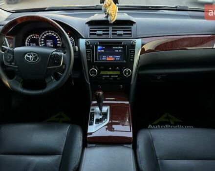 Черный Тойота Камри, объемом двигателя 2.5 л и пробегом 235 тыс. км за 16500 $, фото 24 на Automoto.ua