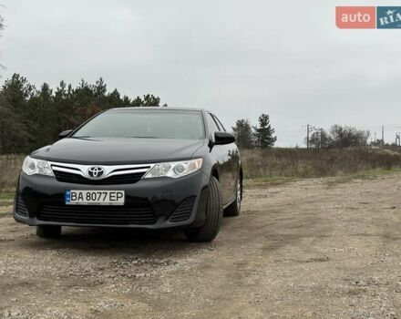 Чорний Тойота Камрі, об'ємом двигуна 2.5 л та пробігом 153 тис. км за 12800 $, фото 1 на Automoto.ua
