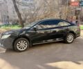 Черный Тойота Камри, объемом двигателя 2.5 л и пробегом 261 тыс. км за 14900 $, фото 1 на Automoto.ua