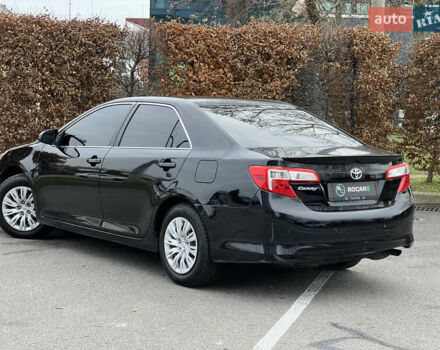 Чорний Тойота Камрі, об'ємом двигуна 2.49 л та пробігом 199 тис. км за 10999 $, фото 17 на Automoto.ua