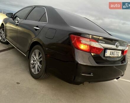 Черный Тойота Камри, объемом двигателя 2.49 л и пробегом 200 тыс. км за 10000 $, фото 11 на Automoto.ua