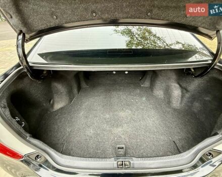 Черный Тойота Камри, объемом двигателя 2.5 л и пробегом 196 тыс. км за 13600 $, фото 68 на Automoto.ua