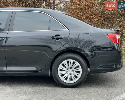 Чорний Тойота Камрі, об'ємом двигуна 2.49 л та пробігом 199 тис. км за 10999 $, фото 12 на Automoto.ua