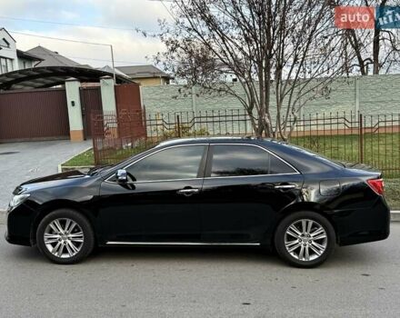 Чорний Тойота Камрі, об'ємом двигуна 2.49 л та пробігом 185 тис. км за 12000 $, фото 6 на Automoto.ua