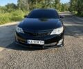 Черный Тойота Камри, объемом двигателя 2.5 л и пробегом 320 тыс. км за 10750 $, фото 1 на Automoto.ua