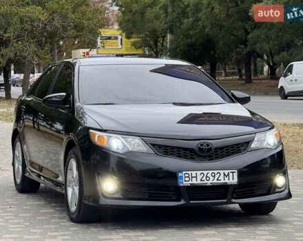 Черный Тойота Камри, объемом двигателя 2.5 л и пробегом 196 тыс. км за 13600 $, фото 3 на Automoto.ua