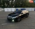 Черный Тойота Камри, объемом двигателя 2.5 л и пробегом 240 тыс. км за 11900 $, фото 1 на Automoto.ua