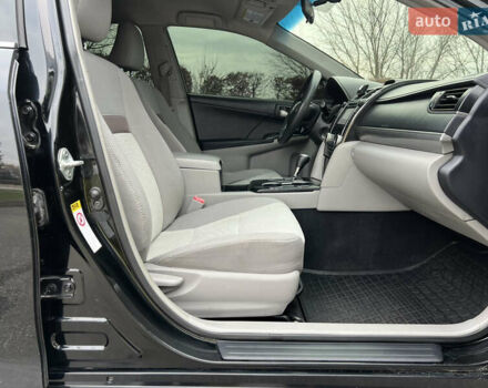 Чорний Тойота Камрі, об'ємом двигуна 2.49 л та пробігом 199 тис. км за 10999 $, фото 49 на Automoto.ua