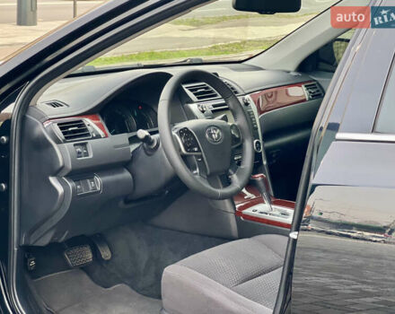 Черный Тойота Камри, объемом двигателя 2.49 л и пробегом 175 тыс. км за 12800 $, фото 28 на Automoto.ua