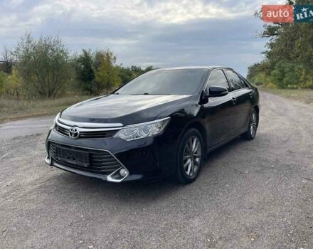 Черный Тойота Камри, объемом двигателя 2.5 л и пробегом 188 тыс. км за 15300 $, фото 1 на Automoto.ua