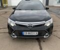Черный Тойота Камри, объемом двигателя 2.49 л и пробегом 256 тыс. км за 16800 $, фото 1 на Automoto.ua