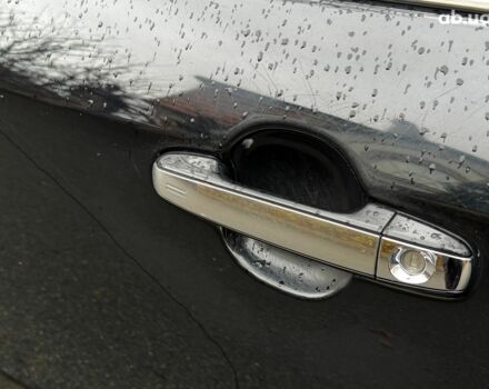 Черный Тойота Камри, объемом двигателя 2.5 л и пробегом 257 тыс. км за 13990 $, фото 14 на Automoto.ua