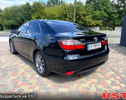 Черный Тойота Камри, объемом двигателя 2.5 л и пробегом 188 тыс. км за 14500 $, фото 1 на Automoto.ua