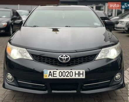 Черный Тойота Камри, объемом двигателя 2.49 л и пробегом 210 тыс. км за 12300 $, фото 1 на Automoto.ua