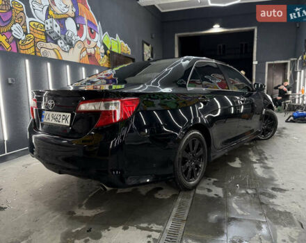 Черный Тойота Камри, объемом двигателя 2.49 л и пробегом 256 тыс. км за 11500 $, фото 2 на Automoto.ua