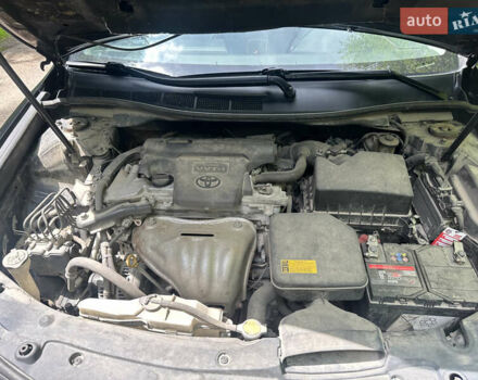 Черный Тойота Камри, объемом двигателя 2.5 л и пробегом 156 тыс. км за 11800 $, фото 1 на Automoto.ua