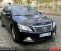 Черный Тойота Камри, объемом двигателя 2.5 л и пробегом 208 тыс. км за 9500 $, фото 1 на Automoto.ua