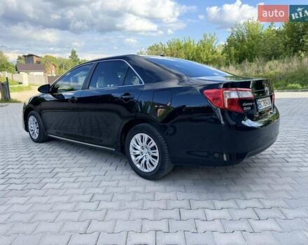 Черный Тойота Камри, объемом двигателя 2.49 л и пробегом 195 тыс. км за 11250 $, фото 4 на Automoto.ua