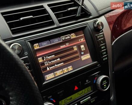 Черный Тойота Камри, объемом двигателя 2.5 л и пробегом 257 тыс. км за 13990 $, фото 21 на Automoto.ua