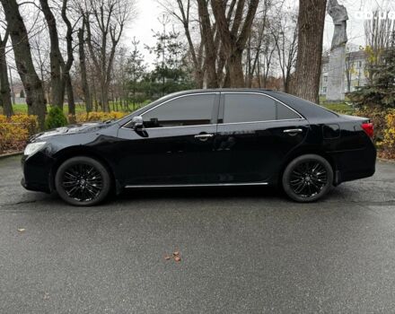 Черный Тойота Камри, объемом двигателя 2.5 л и пробегом 257 тыс. км за 13990 $, фото 13 на Automoto.ua