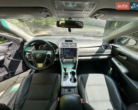 Черный Тойота Камри, объемом двигателя 2.5 л и пробегом 156 тыс. км за 11800 $, фото 4 на Automoto.ua