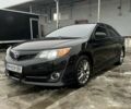 Черный Тойота Камри, объемом двигателя 2.49 л и пробегом 160 тыс. км за 12800 $, фото 1 на Automoto.ua