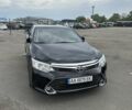 Черный Тойота Камри, объемом двигателя 2.49 л и пробегом 195 тыс. км за 15250 $, фото 1 на Automoto.ua