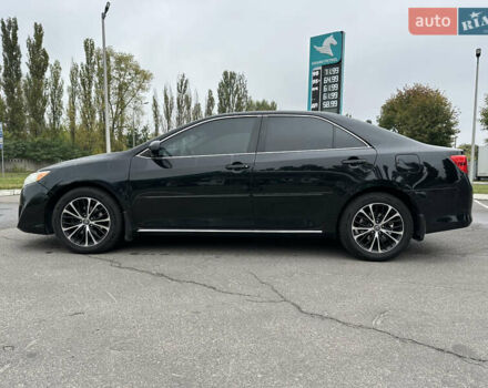 Черный Тойота Камри, объемом двигателя 2.49 л и пробегом 220 тыс. км за 10900 $, фото 7 на Automoto.ua