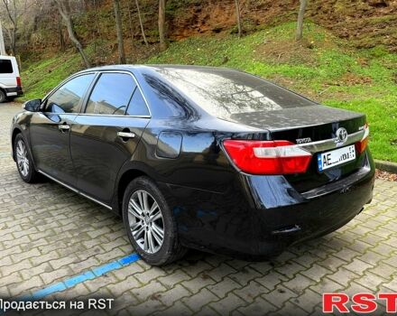 Черный Тойота Камри, объемом двигателя 2.5 л и пробегом 208 тыс. км за 9500 $, фото 5 на Automoto.ua