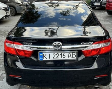 Черный Тойота Камри, объемом двигателя 2.5 л и пробегом 257 тыс. км за 15400 $, фото 1 на Automoto.ua