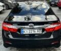 Черный Тойота Камри, объемом двигателя 2.5 л и пробегом 257 тыс. км за 15400 $, фото 1 на Automoto.ua