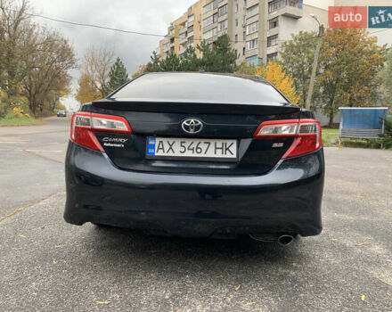 Черный Тойота Камри, объемом двигателя 2.49 л и пробегом 198 тыс. км за 11300 $, фото 5 на Automoto.ua