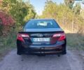 Черный Тойота Камри, объемом двигателя 2.5 л и пробегом 130 тыс. км за 12100 $, фото 4 на Automoto.ua