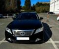 Черный Тойота Камри, объемом двигателя 2.5 л и пробегом 128 тыс. км за 15000 $, фото 1 на Automoto.ua